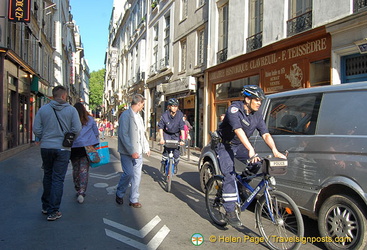 Gendarmes on bikes on rue Saint-Andre des Arts in the 6th arrondissement